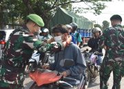 Antisipasi Abu Vulkanik, Korem 043/Gatam Bagikan Masker dan Bersihkan Sekolah di Metro